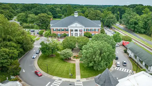 Aerial view of Matthews town hall linking to Matthews lawn care services.