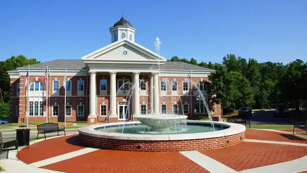 View of Mint Hill town hall linking to Mint Hill lawn care services.